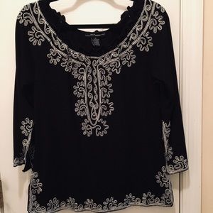 Festive black blouse with metallic silver ribbing